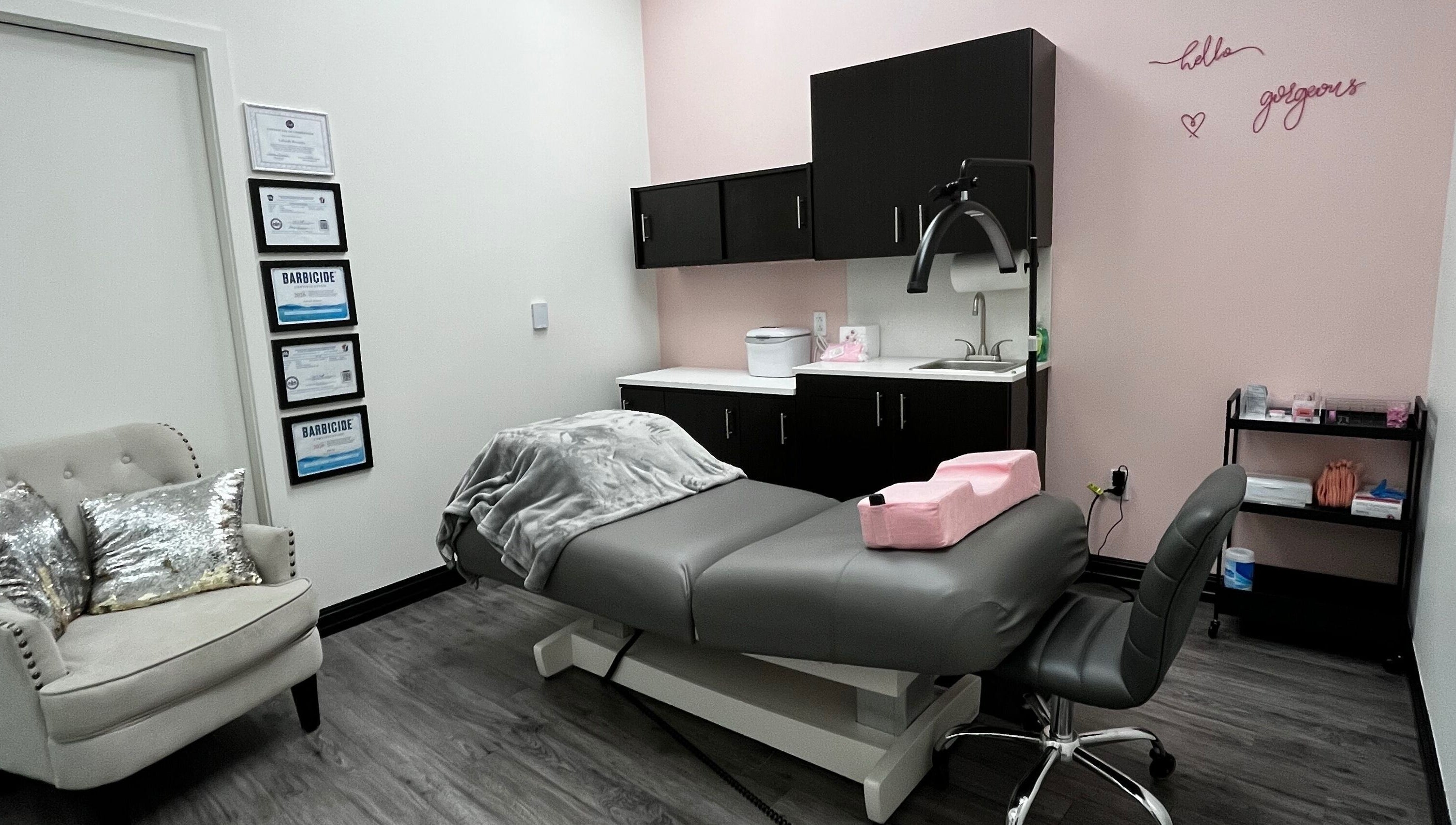 Chic treatment room at A&A Lash Artistry in Richboro, Pennsylvania, featuring a plush chair and treatment bed.