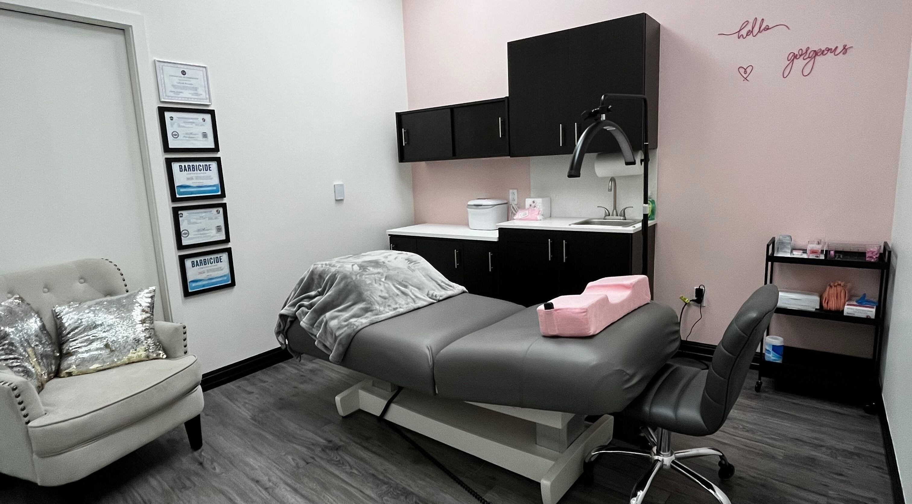 Chic treatment room at A&A Lash Artistry in Richboro, Pennsylvania, featuring a plush chair and treatment bed.