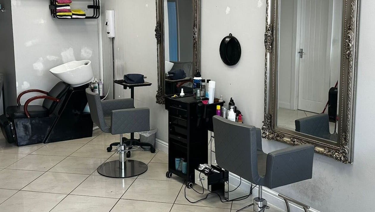 Chic interior of Mlinko hair with stylish chairs and mirrors in Bournemouth, England, GB.