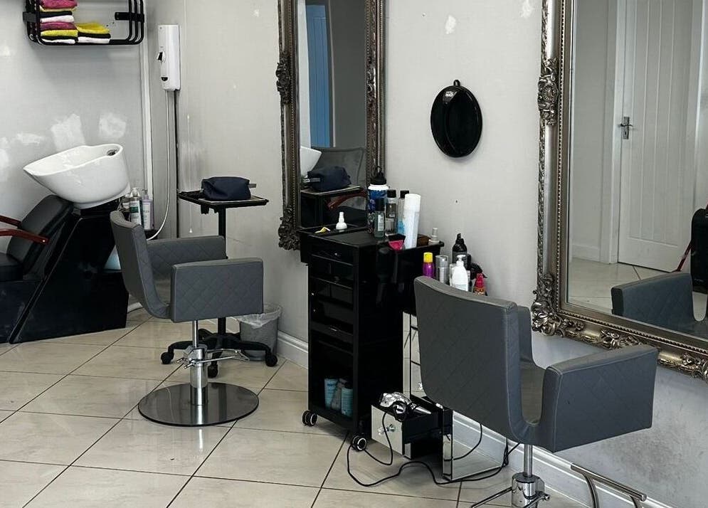 Chic interior of Mlinko hair with stylish chairs and mirrors in Bournemouth, England, GB.
