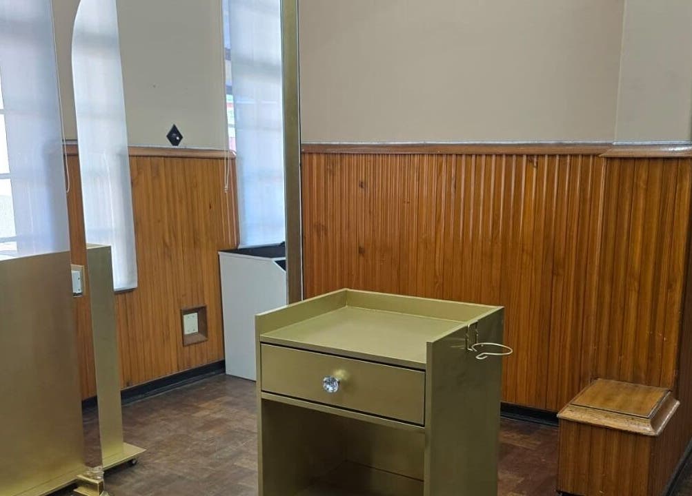 Elegant golden styling station at On The Edge Prostyling, Upington, Northern Cape, ZA with wooden decor.