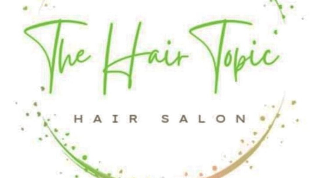 Logo of The Hair Topic salon in Portmore, St. Catherine Parish, JM featuring elegant green script.