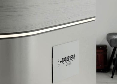 Modern interior at Barber Boy Studio in Horsham, England, GB accentuating sleek design elements.