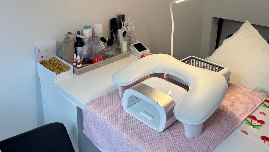 Nail spa station at The Cherry Lounge, Boughton Monchelsea, England, GB with manicure tools and UV lamp.
