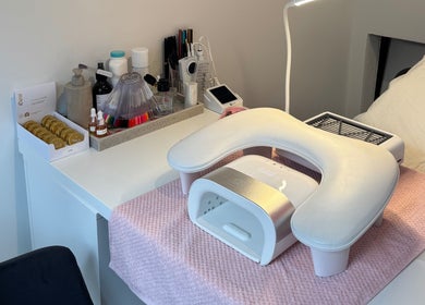 Nail spa station at The Cherry Lounge, Boughton Monchelsea, England, GB with manicure tools and UV lamp.