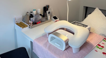 Nail spa station at The Cherry Lounge, Boughton Monchelsea, England, GB with manicure tools and UV lamp.