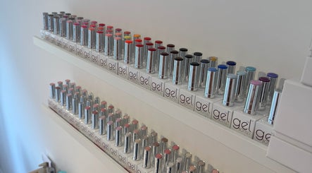 Vibrant gel nail polish display at The Cherry Lounge, Boughton Monchelsea, England, GB.