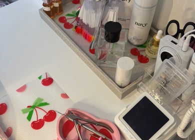 Nail care setup at The Cherry Lounge, Boughton Monchelsea, England, GB, featuring tools and products.