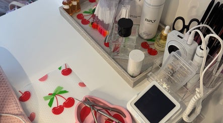 Nail care setup at The Cherry Lounge, Boughton Monchelsea, England, GB, featuring tools and products.