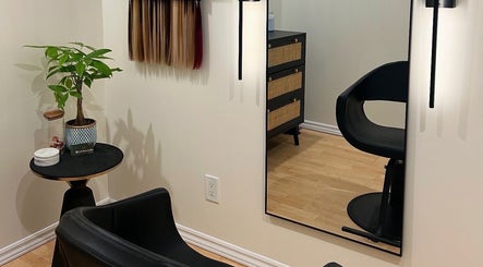 Chic salon nook at Syds Hair Studio in Bowmanville, Ontario, CA with modern decor and styling chair.