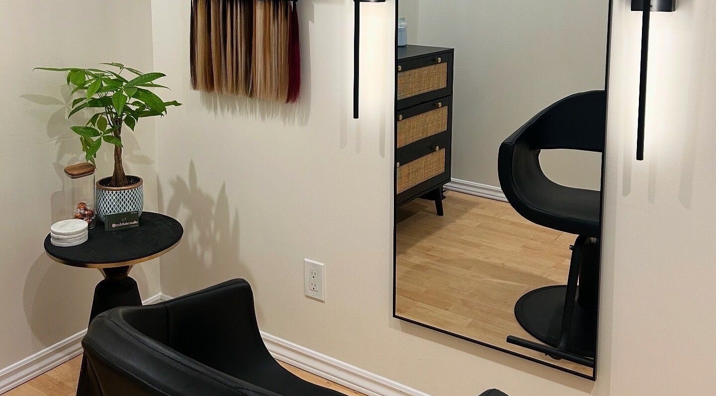 Chic salon nook at Syds Hair Studio in Bowmanville, Ontario, CA with modern decor and styling chair.