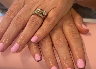 Manicured pink nails at Belle Lily Beauty in Aspley Guise, England, GB showcasing elegant nail artistry.