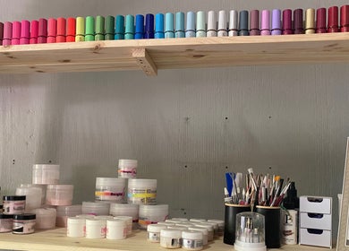 Nail polish and supplies at Sculpted by Monique, Kempton Park, Gauteng, ZA showcasing diverse colors.