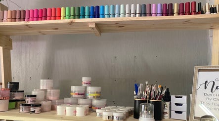 Nail polish and supplies at Sculpted by Monique, Kempton Park, Gauteng, ZA showcasing diverse colors.