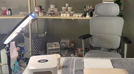 Professional nail setup at Sculpted by Monique, Kempton Park, Gauteng, ZA. Neat workspace with essential tools.