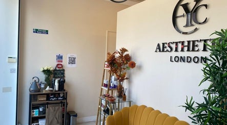 Reception area of EverYoung Medical Aesthetics Clinic, London, England with welcoming decor and seating.