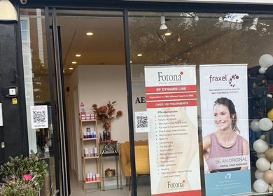 Front view of EverYoung Medical Aesthetics Clinic in London, England, GB, showcasing entrance and promotional banners.
