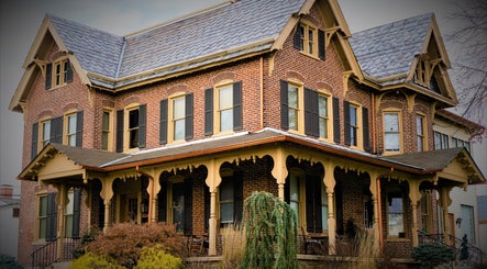 Prodigo Day Spa & Salon in a vintage brick house, Harleysville, Pennsylvania, US, offering serene beauty and wellness.