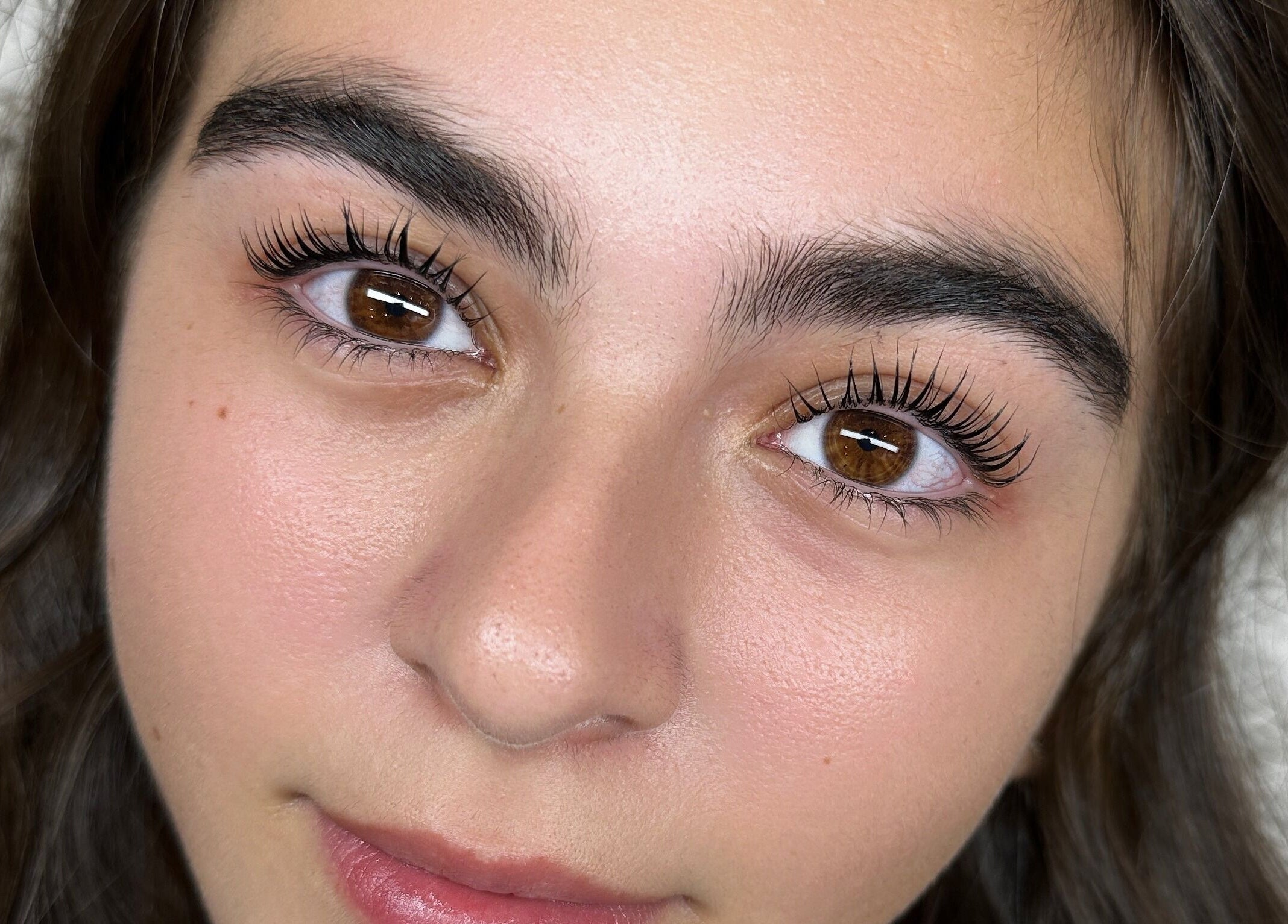 Close-up of a woman's eyes with stunning lashes at DAZEDEBEAU in Vaughan, Ontario, CA.