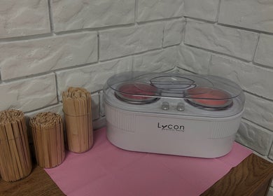 Waxing setup at Elóre Beauty in Lawnton, Queensland, AU featuring Lycon equipment and sticks.