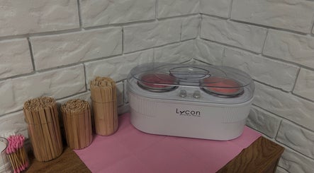 Waxing setup at Elóre Beauty in Lawnton, Queensland, AU featuring Lycon equipment and sticks.