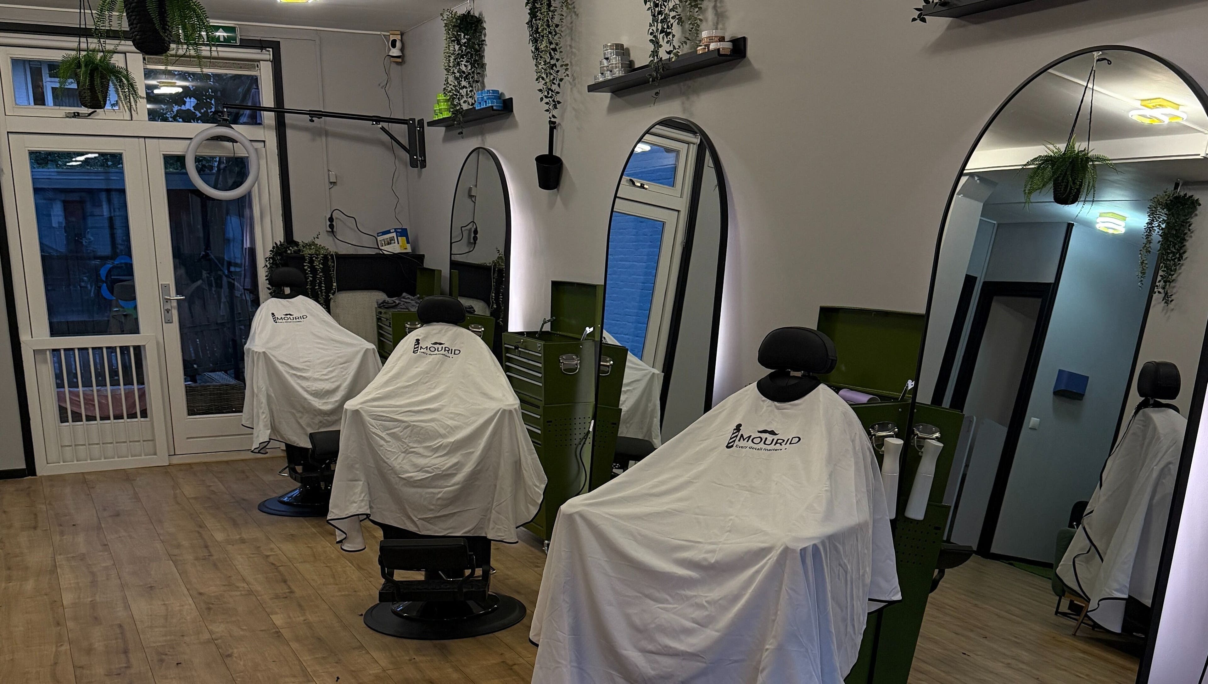 Modern barber chairs at Mourid Zuid in Amsterdam, Noord-Holland, NL, ready for clients.