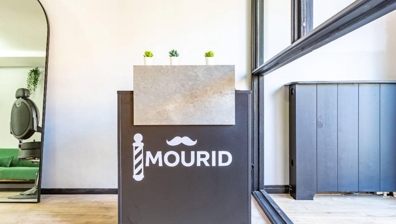 Modern reception area at Mourid Zuid, Amsterdam, Noord-Holland, NL with stylish furniture and decor.