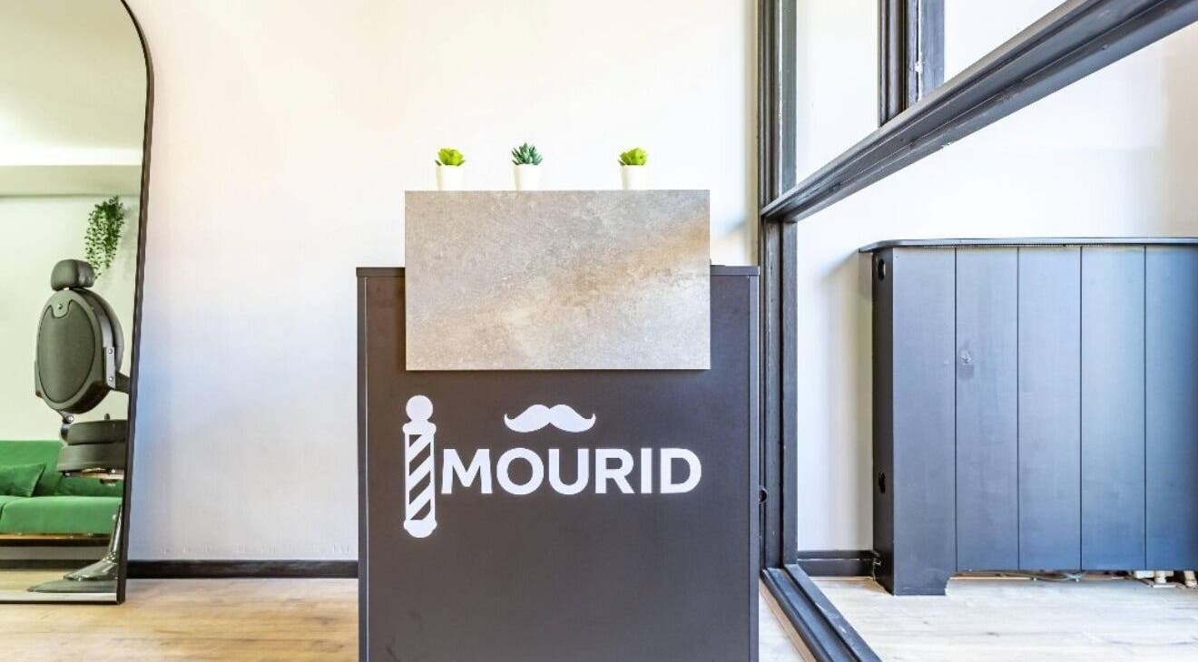 Modern reception area at Mourid Zuid, Amsterdam, Noord-Holland, NL with stylish furniture and decor.