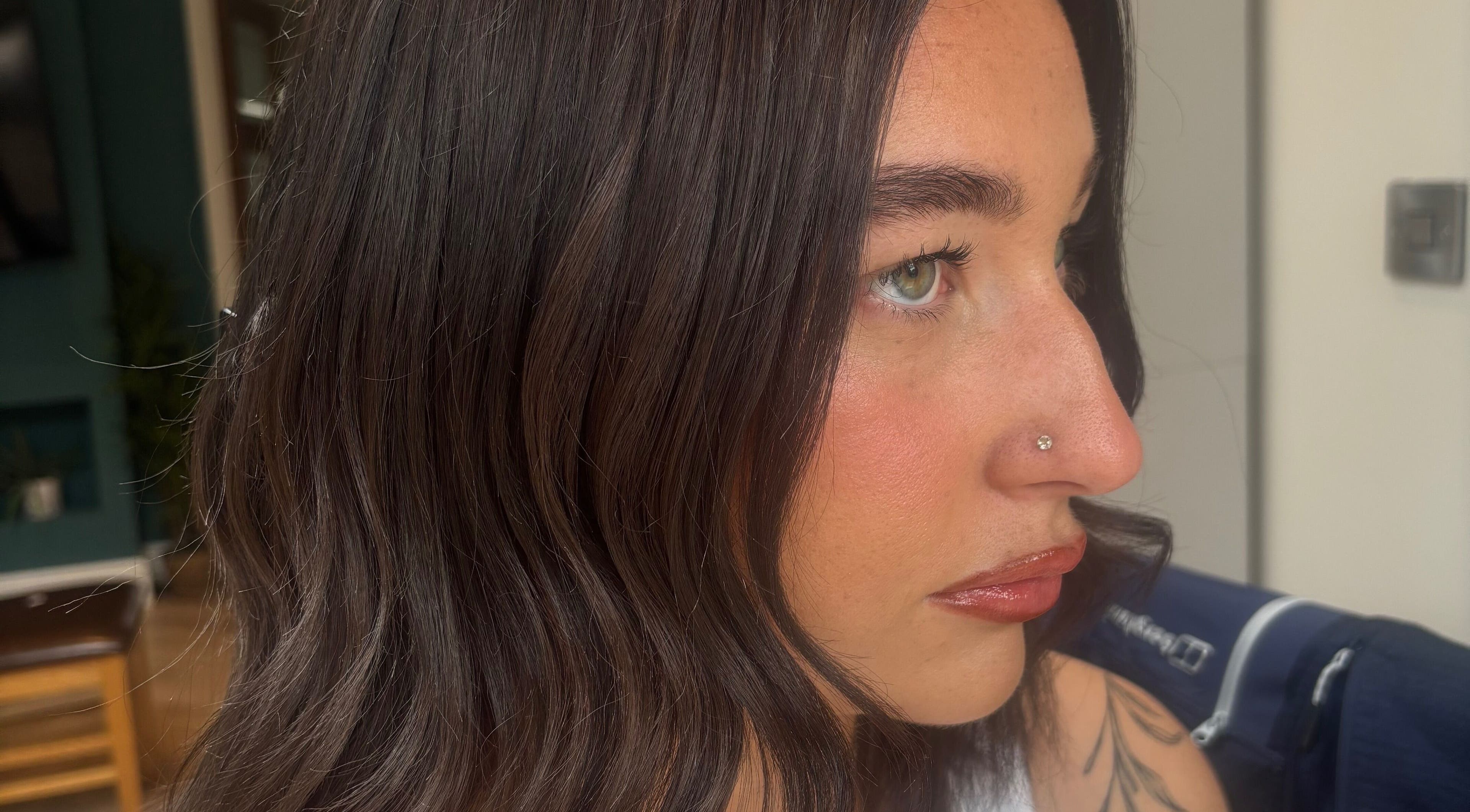 Close-up of sleek brunette hairstyle at Styled By Eve in Stockton-on-tees, England, GB.