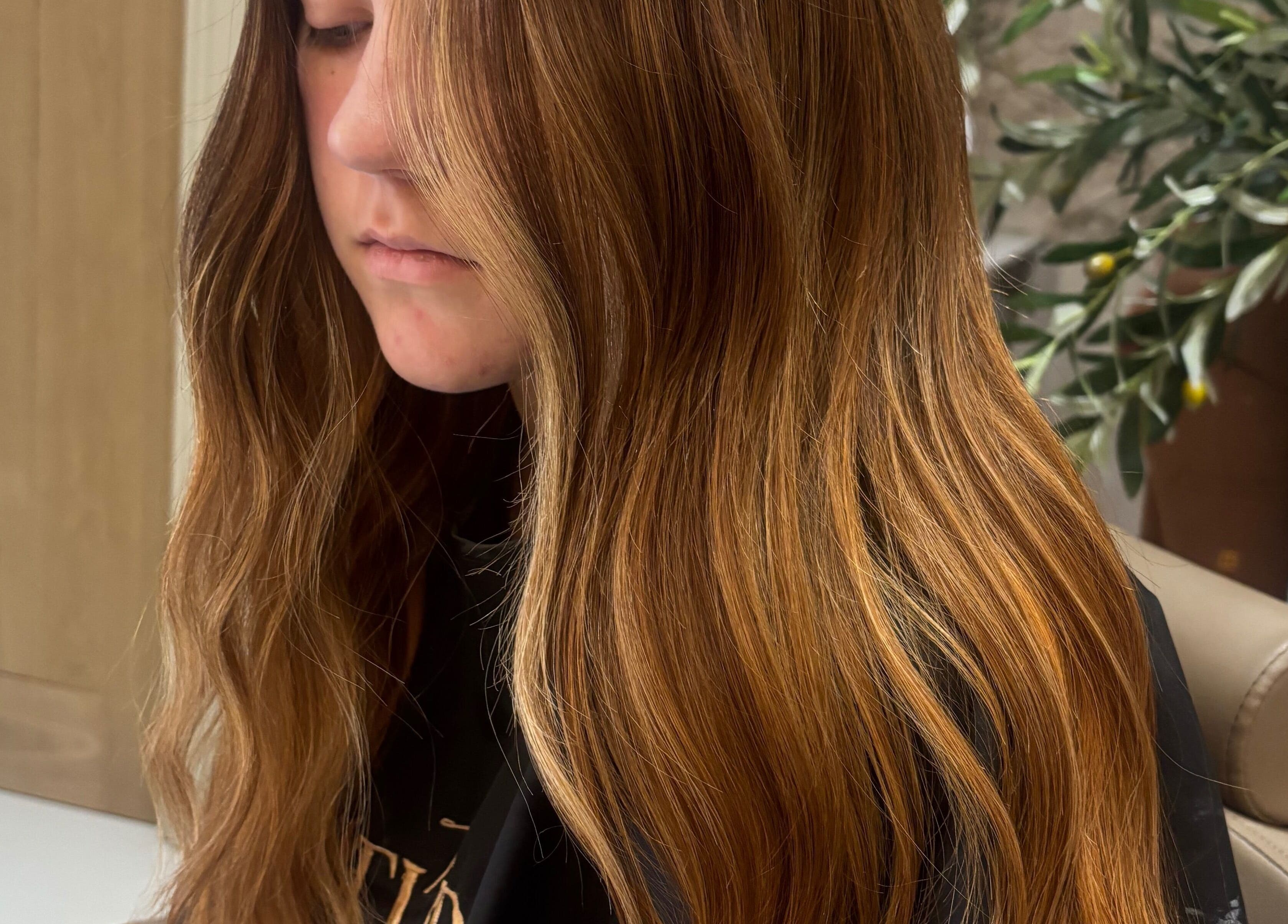 Elegant wavy hairstyle at Styled By Eve, Billingham, England, GB, showcasing rich brown highlights.