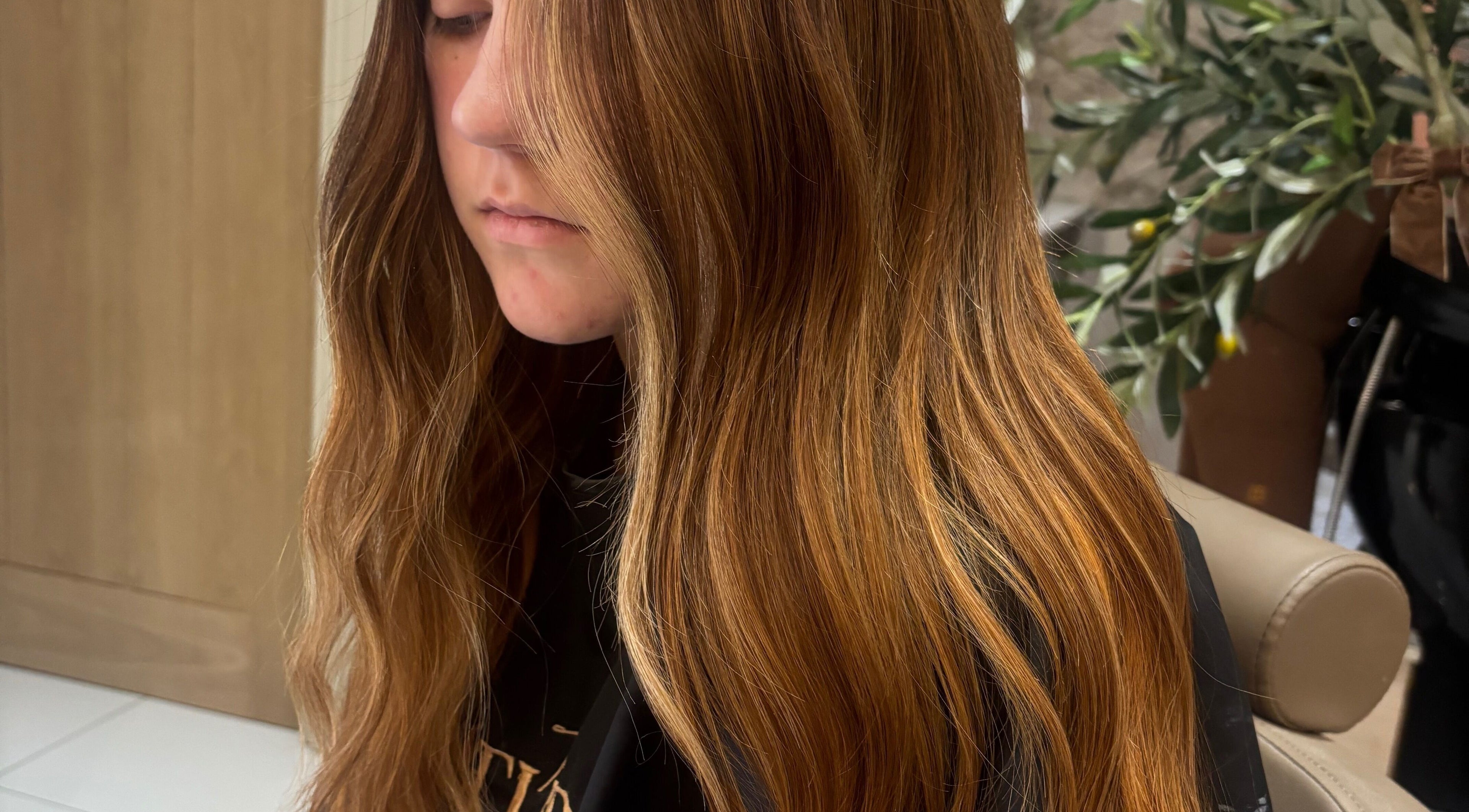 Long, wavy golden hair styled at Styled By Eve in Billingham, England, GB.