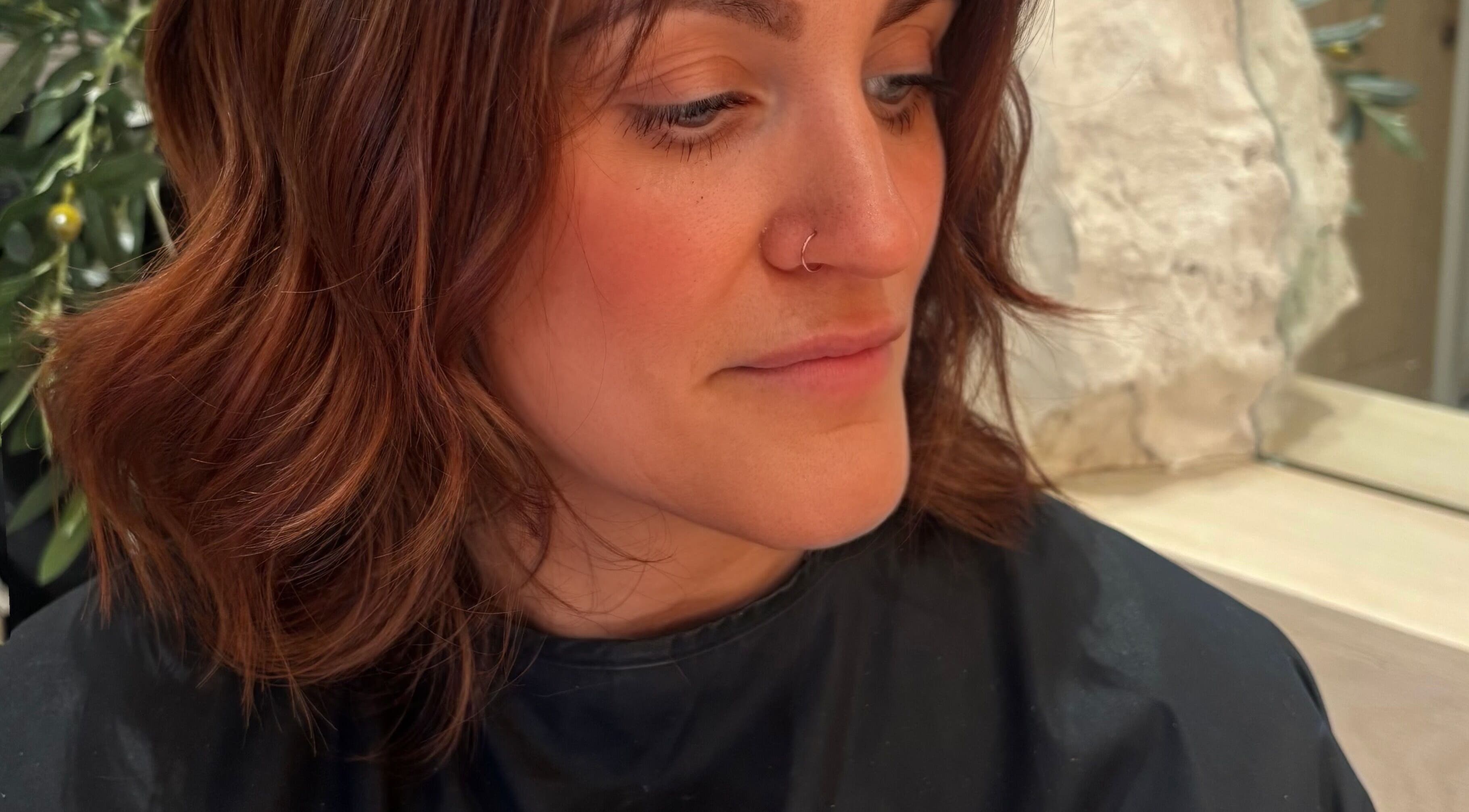 Styled By Eve showcases warm-toned hair styling in Billingham, England, GB. A detailed close-up of fresh curls.