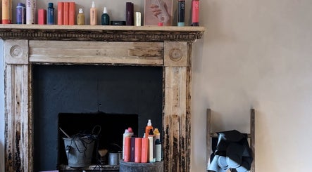 Elegant product display at Folly & Hue Hair And Beauty Studio, Bradford-on-Avon, England, GB.
