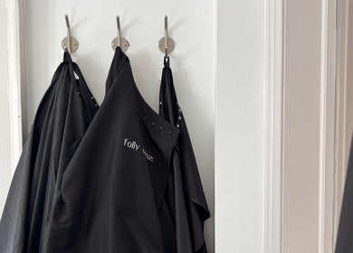 Elegant hair aprons at Folly & Hue Hair And Beauty Studio in Bradford-on-avon, England, GB.