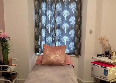 Relaxing treatment room at Heavenly Treatments with Hayleybell, Kelso, Scotland, GB, featuring a cozy bed and decor.