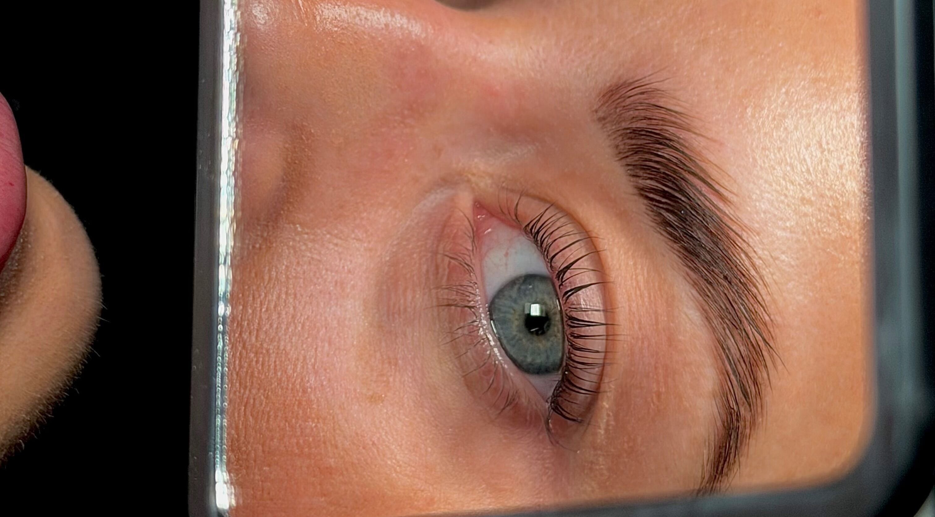 Close-up of eye with reflection, captured at Mani’s by Millie May in Bridgend, Wales, GB.