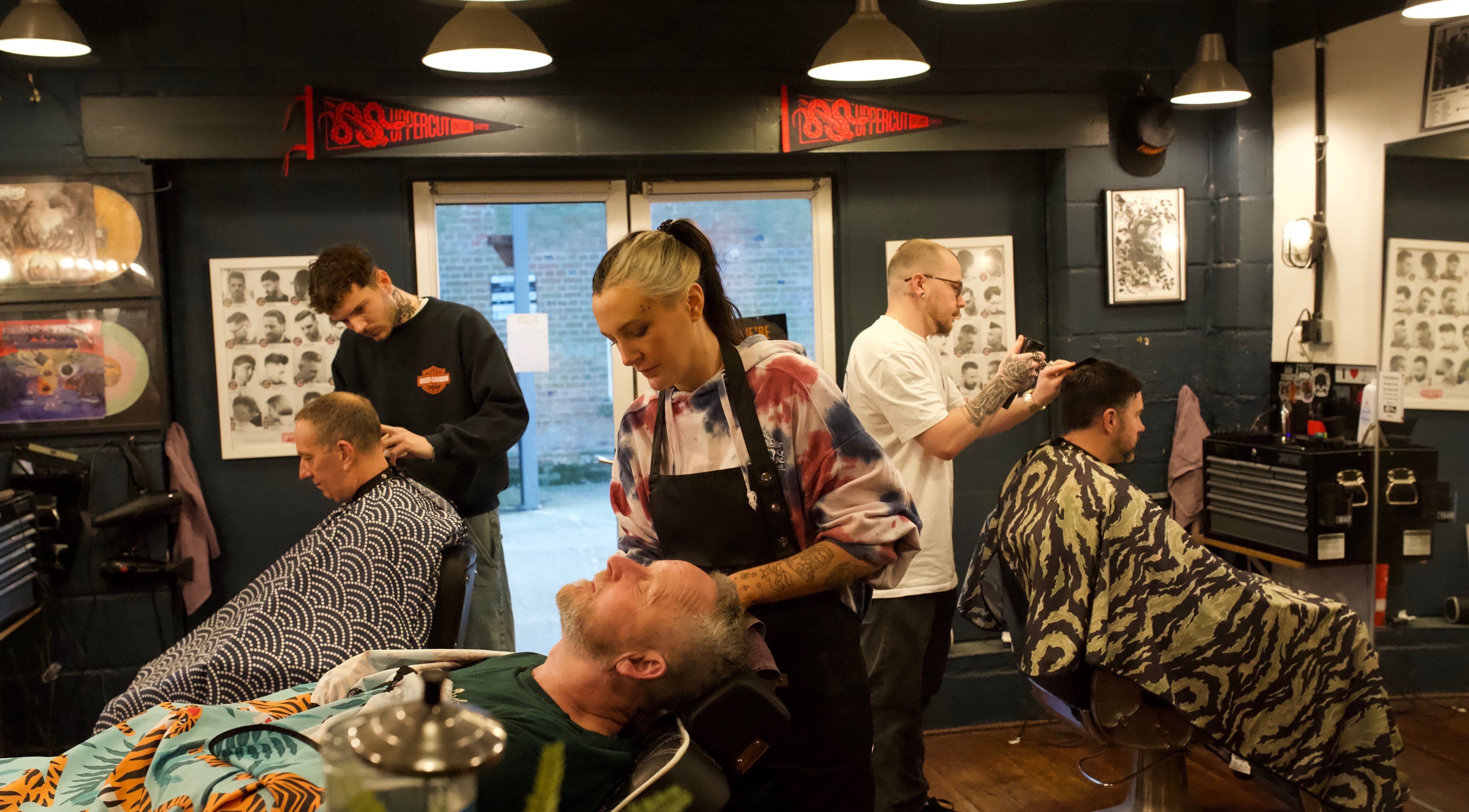 Inside Jack Rabbits Barbers Botley, barbers are expertly styling clients' hair in Botley, England, GB.