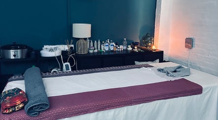 Tranquil massage room setup at Afon Thai Massage, Cardiff, Wales, GB, showcasing relaxing ambiance.