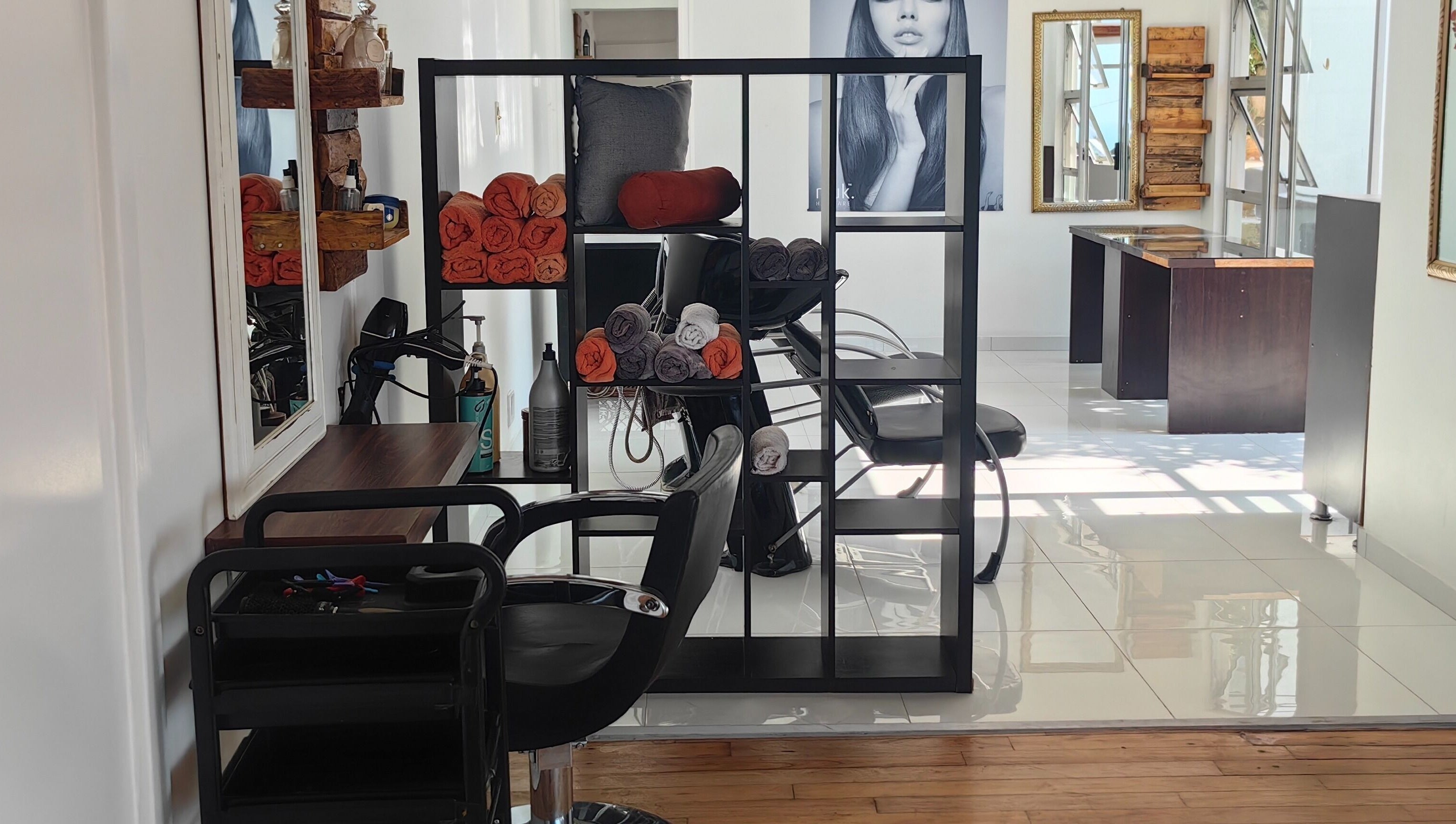 Modern interior of Jenny's Wellness Center in Amanzimtoti, Kwazulu-Natal, ZA featuring stylish seating and decor.