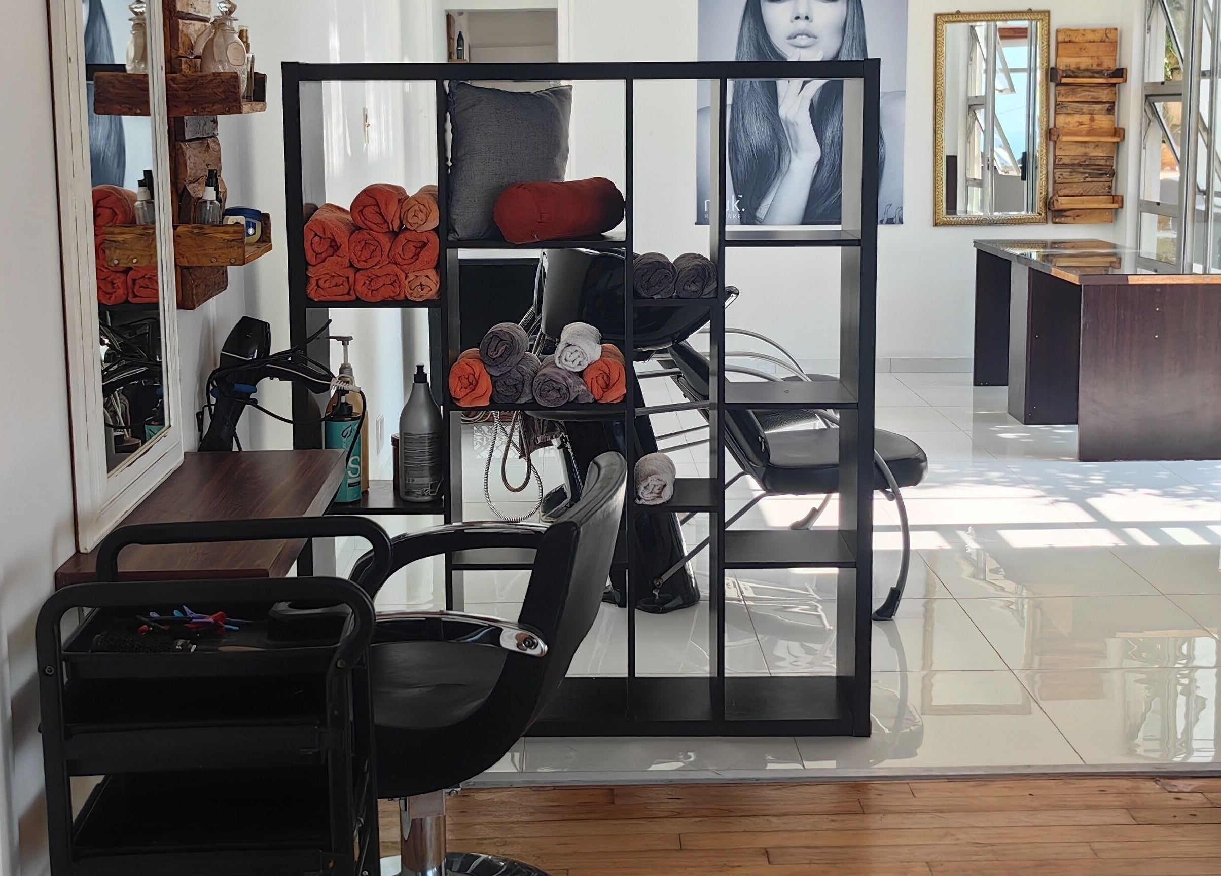 Modern interior of Jenny's Wellness Center in Amanzimtoti, Kwazulu-Natal, ZA featuring stylish seating and decor.