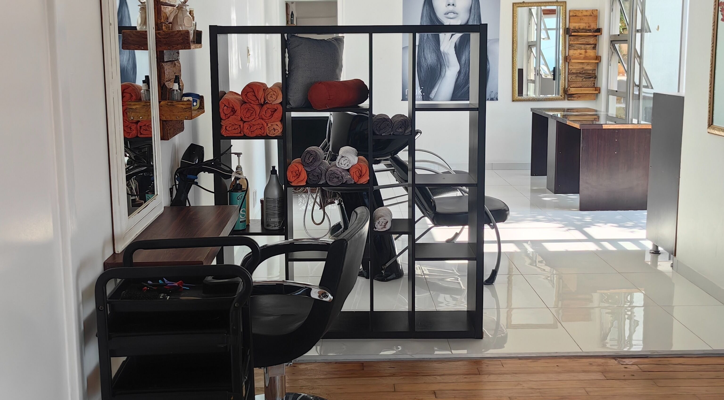 Modern interior of Jenny's Wellness Center in Amanzimtoti, Kwazulu-Natal, ZA featuring stylish seating and decor.