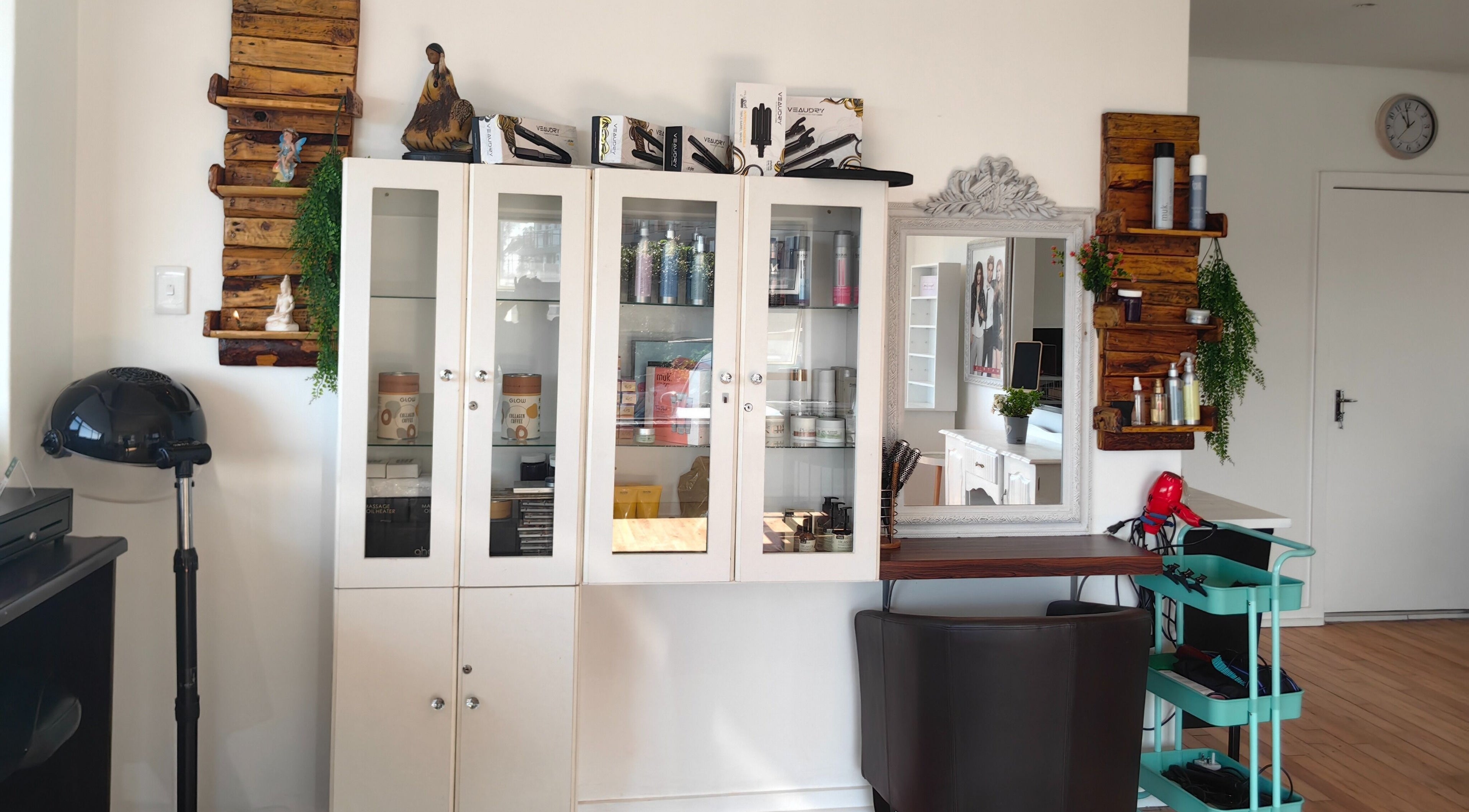Stylish salon corner at Jenny's wellness center, Amanzimtoti, Kwazulu-natal, ZA with shelves and products.