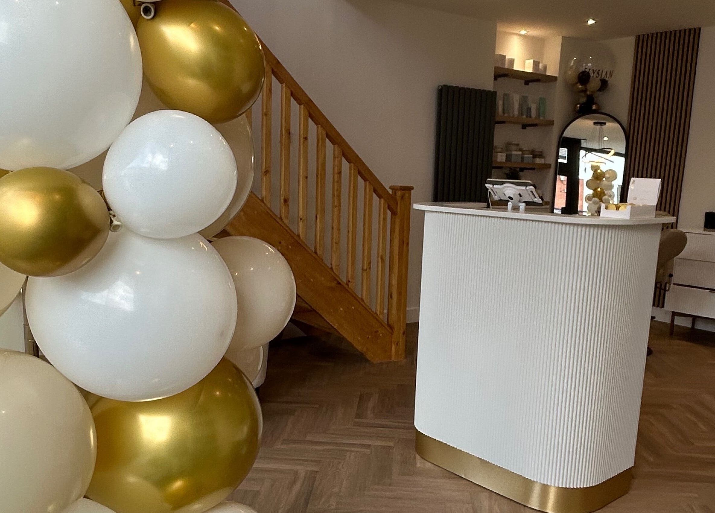 Reception of Elysian - Wilpshire with gold balloons, located in Blackburn, England, GB.