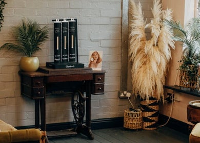 Cozy corner in House of Swain HAIR & EXTENSION SALON, Whitehaven, England, GB, featuring elegant decor and plants.