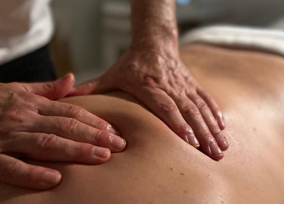 Hands providing a soothing massage at JM Massage Therapy, London, England, GB.