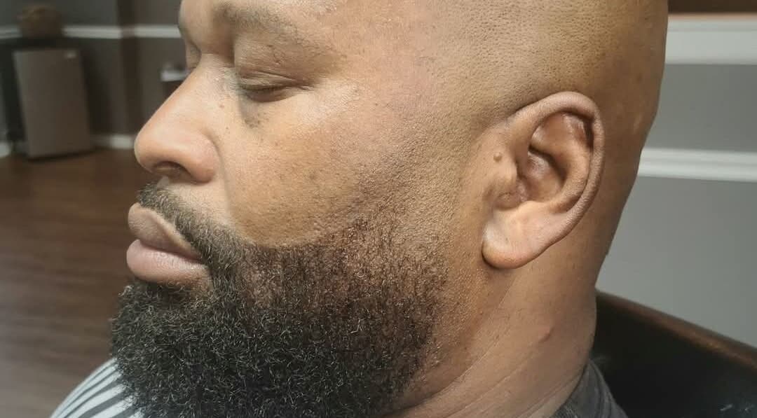 Close-up of a man with a styled beard at Tiffany B in Aiken, South Carolina, US.