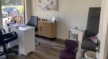 Elegant nail salon seating with modern chairs at Purple Nail, Montgomery, Texas, US.