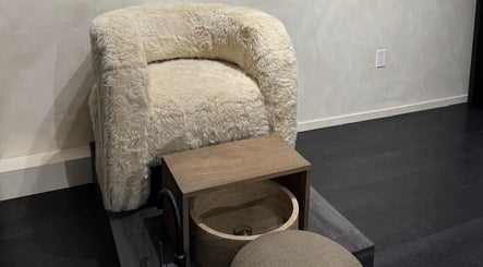 Luxurious pedicure chair with plush white fur at Beauté De Mart in Glendale, California, US.
