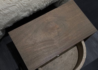 Wooden table beside cozy fur blanket at Beauté De Mart, Glendale, California, US.
