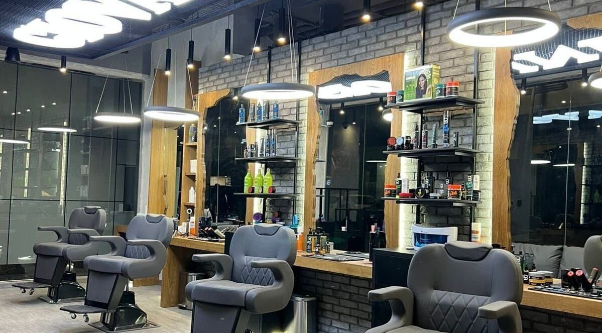Modern salon chairs and products at Giovanni Gents Salon, Abu Dhabi, Abu Dhabi, AE.